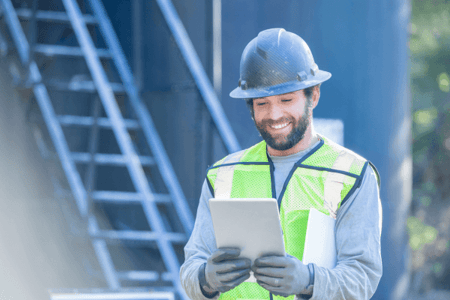 Oil and gas worker using an ipad